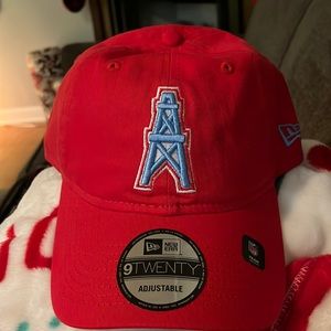 Red adjustable oilers hat.